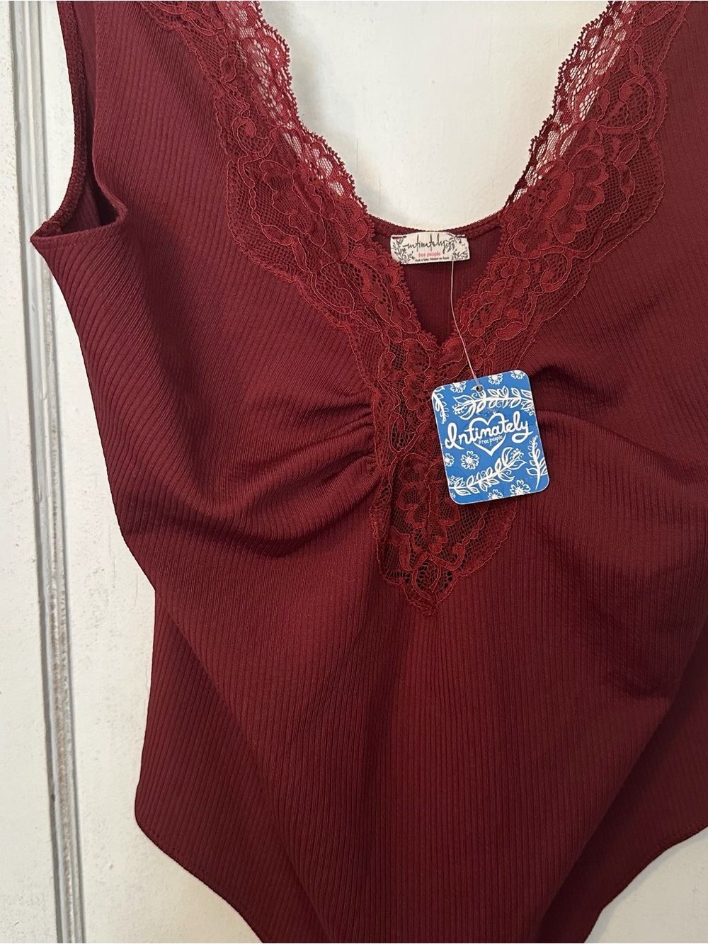 Free People Lace-Trim Ribbed Bodysuit in Deep Wine